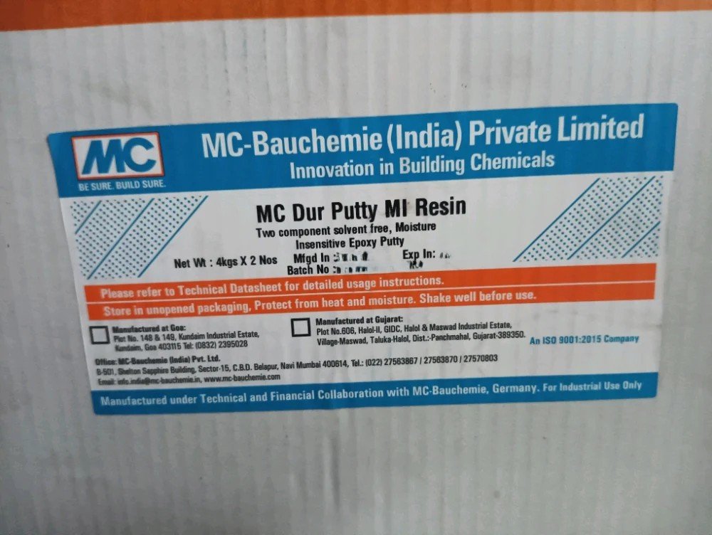 MC-DUR Putty-MI, a moisture-insensitive, solvent-free epoxy repair mortar for concrete surfaces.